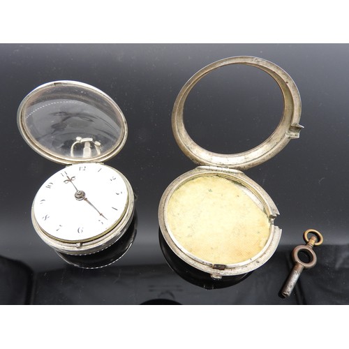 559 - A SILVER PAIR CASED POCKET WATCH THE MOVEMENT SIGNED BARKER 3399, the case hallmarked for London 179... 