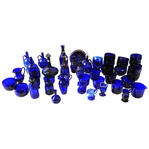 301 - A LARGE COLLECTION OF BRISTOL BLUE GLASS WARES, MOSTLY EARLY 19TH CENTURY, the large group includes ... 