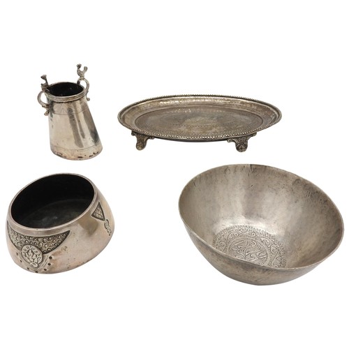 551 - AN GROUP OF CONTINENTAL SILVER ITEMS, the lot includes an Indian oval form waiter with chased decora... 