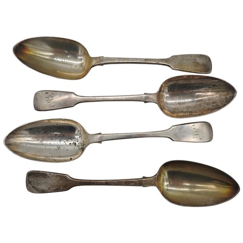 543 - A SET OF FOUR GEORGE III SILVER SERVING SPOONS, fiddle pattern, two with engraved monogram, bears th... 