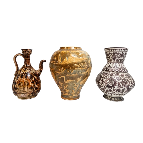 313 - A PERSIAN / NEAR EASTERN BALUSTER VASE AND TIN GLAZED EWER, the baluster vase with traditional rural... 