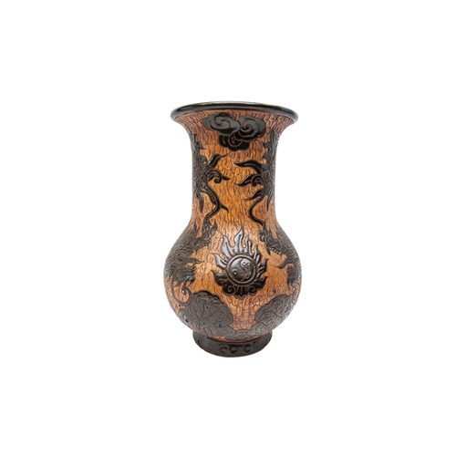 269 - A VINTAGE DONA SAIGON EARTHENWARE VASE, CIRCA 1960, the sides decorated with coiled scaly dragons on... 