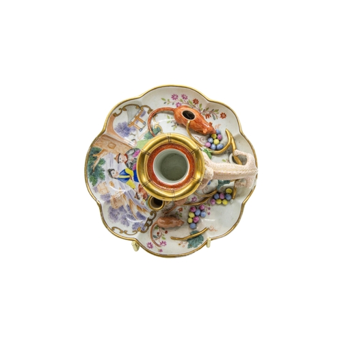 413 - A MEISSEN CHAMBERSTICK AND MEISSEN CUP AND SAUCER, 18TH/19TH CENTURY, the lobed chamberstick painted... 