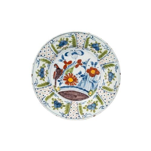 280 - THREE LARGE DELFT DISHES, 18TH CENTURY, consisting of two dishes painted with traditional rural scen... 