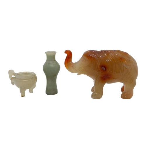 193 - FOUR PIECES OF PEKING GLASS AND A CARVED HARDSTONE ELEPHANT, along with a carved hardstone cup, a mi... 