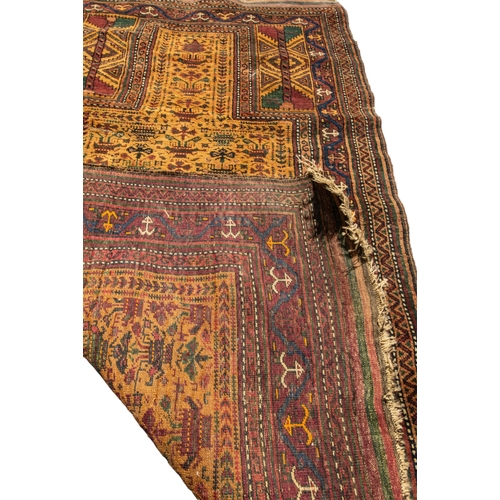 251 - A HAND KNOTTED PERSIAN WOOL BELOUCH PRAYER RUG, LATE 19TH / EARLY 20TH CENTURY, with flat weave ends... 