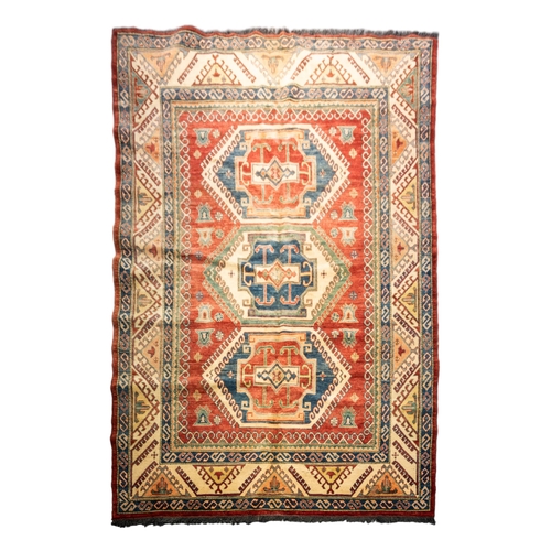 258 - A HAND KNOTTED PERSIAN RUG, MID-LATE 20TH CENTURY, probably Kazhak, small area of damage332 x 200 cm... 