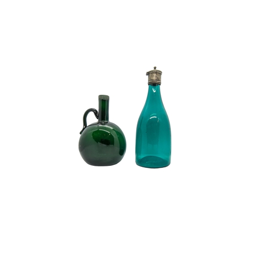 149 - A GROUP OF FIVE EARLY 19TH CENTURY SPIRIT DECANTERS, A PAIR OF EMERALD GREEN GLASS DECANTERS AND THR... 