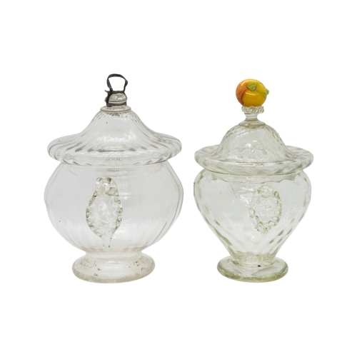 164 - TWO VENETIAN GLASS JARS18th/19th century, one with fruit finial, the other final broken off, 15cms h... 