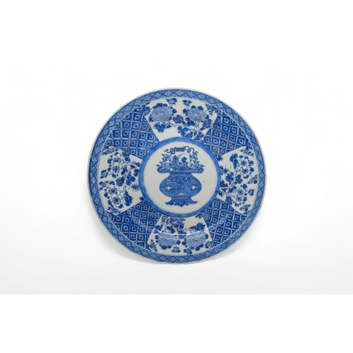 214 - A GROUP OF FOUR CHINESE BLUE AND WHITE DISHESKANGXI PERIOD (1662-1722)25cm - 28cm diam