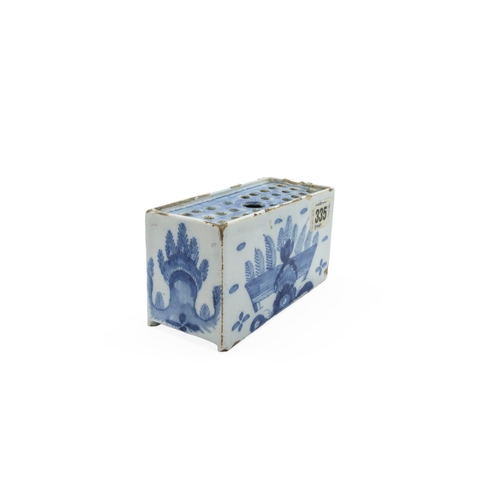 288 - A DELFT FLOWER BRICK18th century, 14cms wide and a polychrome tile