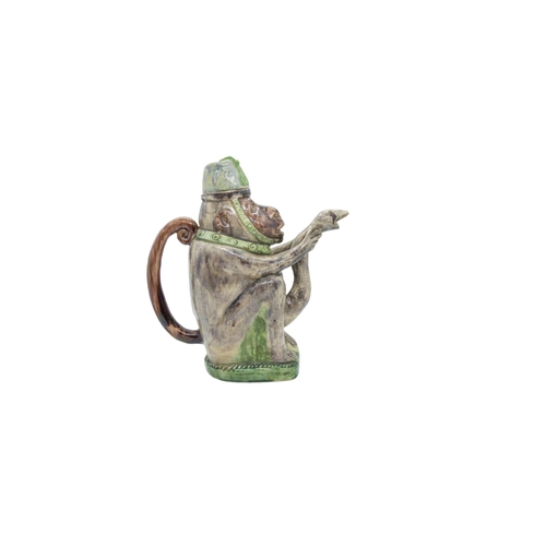 342 - A MONKEY FORM TEAPOT19th century, probably French, 23cms high