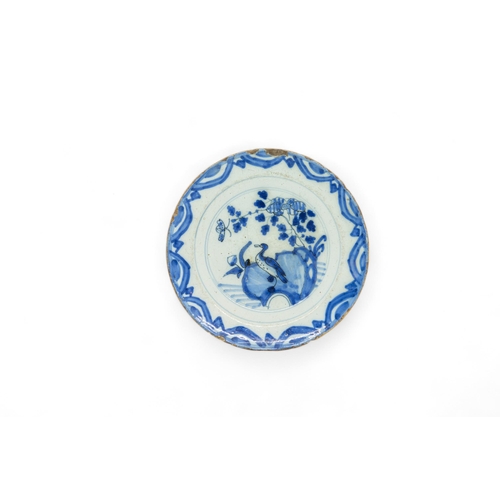 294 - FIVE DELFT PLATES AND A SOUP PLATE18th century, 23cms wide