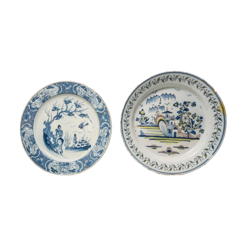 351 - FIVE TIN GLAZED CHARGERS18th century, including a Bristol example in the Niglet style, 33cms wide... 