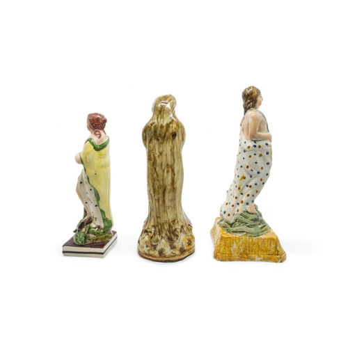 448 - THREE PEARLWARE FIGURESEarly 19th century, tallest is 23cms high