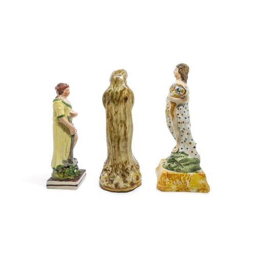 448 - THREE PEARLWARE FIGURESEarly 19th century, tallest is 23cms high