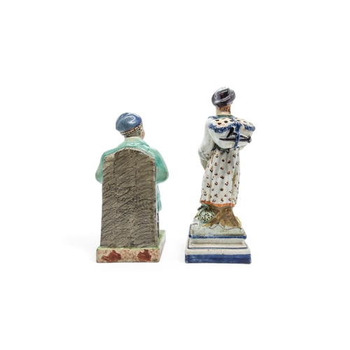 449 - A PEARLWARE FIGURE OF SOUTER JOHNNIEEarly 19th century, the base inscribed 'HH EARLY' 17cms high, to... 