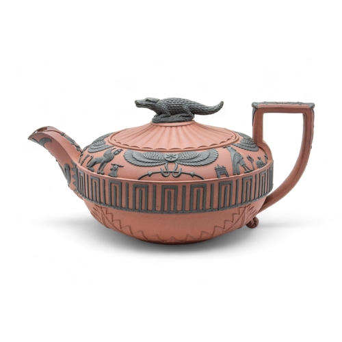 462 - A WEDGWOOD ROSSO ANTICO PART TEA SERVICEcirca 1810, comprising a teapot and stand, sucrier, cream ju... 