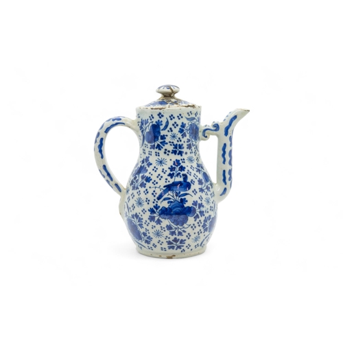 297 - A DELFT GUGLET AND A VASE18th century, guglet is 22.5cms highalong with a coffee pot