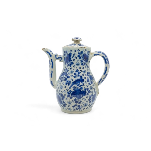 297 - A DELFT GUGLET AND A VASE18th century, guglet is 22.5cms highalong with a coffee pot