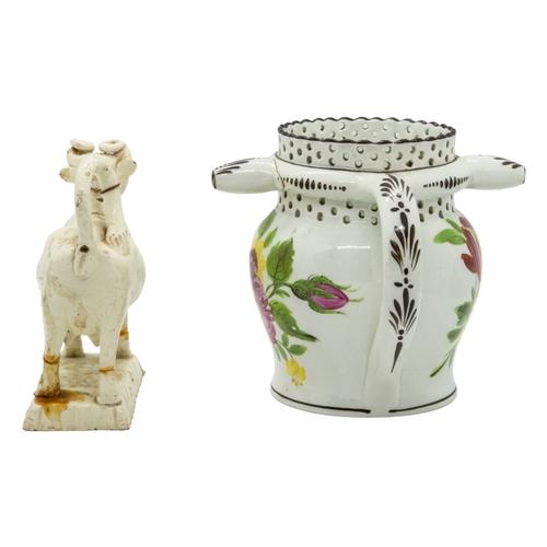 466 - A WILLIAM FIFEILD BRISTOL PUZZLE JUGCirca 1830, together with creamware cow creamer, 12cms high... 