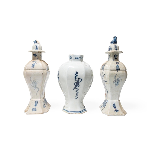 473 - DE METAALE POT; A PAIR OF VASES18th century, both marked to bases, 31cms high. Together with a singl... 