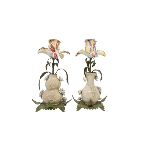 475 - A DECORATIVE PAIR OF CERAMIC AND TOLE CANDLESTICKS20th century, 25cms high