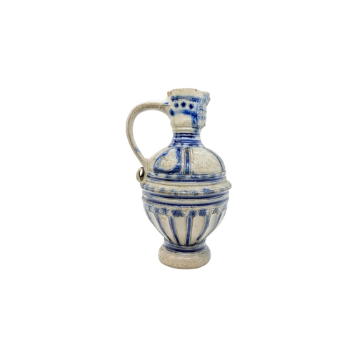 478 - A WESTERWALD STONEWARE JUG18th century, 23cms high