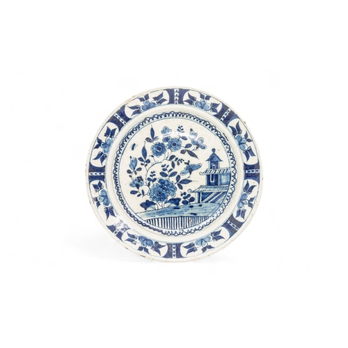 278 - FOUR DELFT CHARGERS18th Century, and a faience charger, 36cms wide