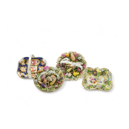 503 - FOUR ENGLISH MINIATURE BASKETSCirca 1840, two with molded shells, one encrusted flowers, the other w... 