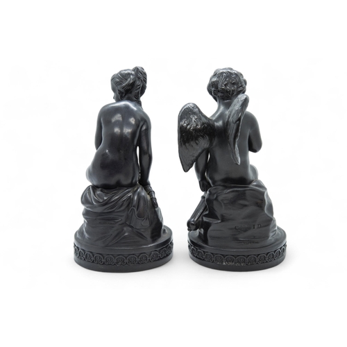 537 - A PAIR OF WEDGWOOD BASALT FIGURES CUPID AND PSYCHE18th / 19th century, 21cms high.