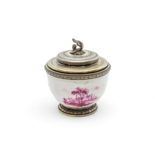 393 - A BERLIN PORCELAIN TEACUP MOUNTED BY RISLER CARREThe porcelain late 18th century, the silver gilt mo... 