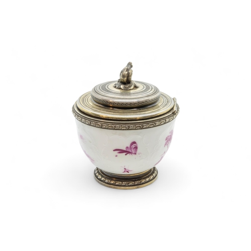 393 - A BERLIN PORCELAIN TEACUP MOUNTED BY RISLER CARREThe porcelain late 18th century, the silver gilt mo... 