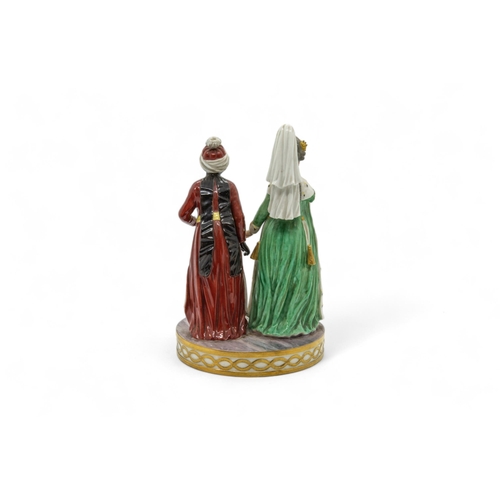 394 - A FRANKENTHAL GROUP TWO FIGURES IN 'TURKISH' COSTUMELate 18th / 19th century 20cms high