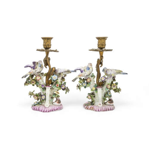 390 - A PAIR OF ORMULU MOUNTED BIRD FIGURES20th century, 23cms high