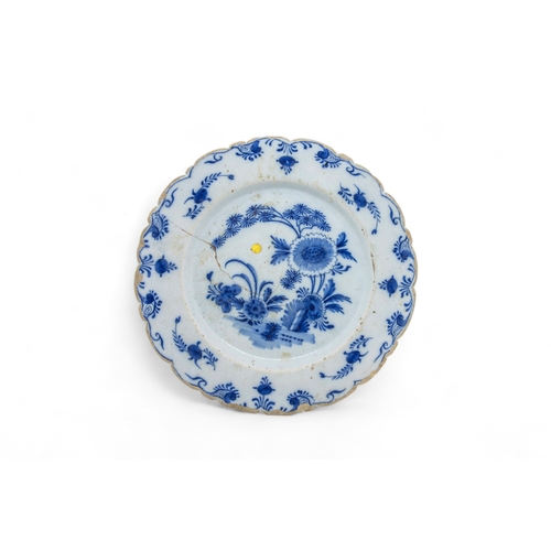 391 - THIRTEEN DELFT PLATES18th century and a speckled tin glazed plate, 22cms wide