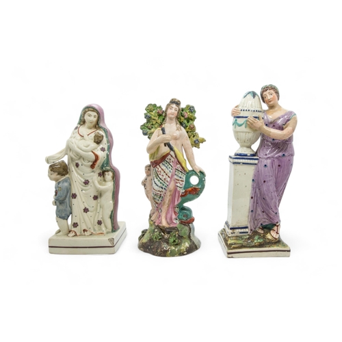 380 - A GROUP OF PEARLWARE FIGURESEarly 19th century,