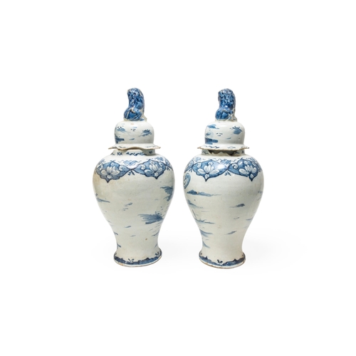 334 - A PAIR OF LARGE DELFT VASES18th century, 41cms high