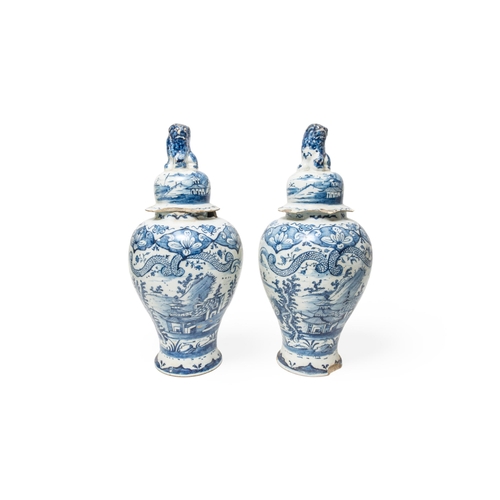 334 - A PAIR OF LARGE DELFT VASES18th century, 41cms high