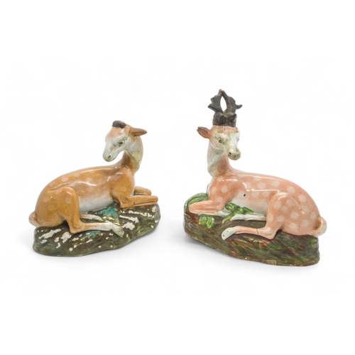 376 - A PEARLWARE STAG AND HINDEarly 19th century,