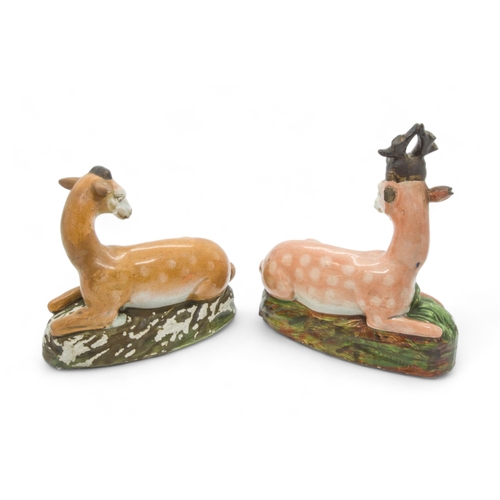 376 - A PEARLWARE STAG AND HINDEarly 19th century,