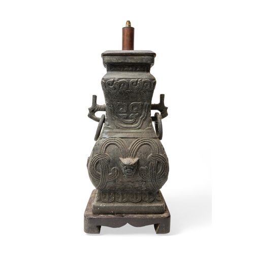 179 - AN CHINESE ARCHAIC STYLE METAL VASE MOUNTED AS LAMP. 20TH CENTURY.