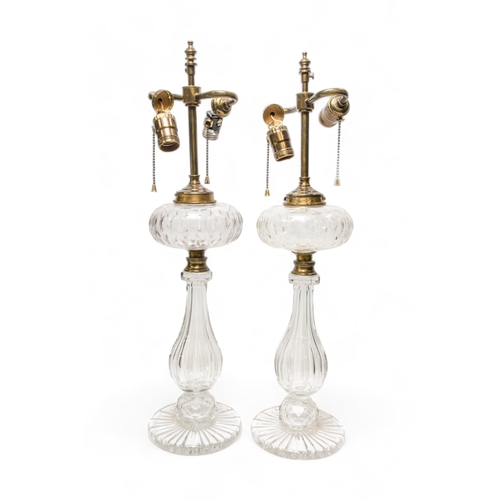 64 - A PAIR OF 19TH CENTURY CUT GLASS OIL LAMP BASES OF BALUSTER FORM, the cut reservoirs later converted... 