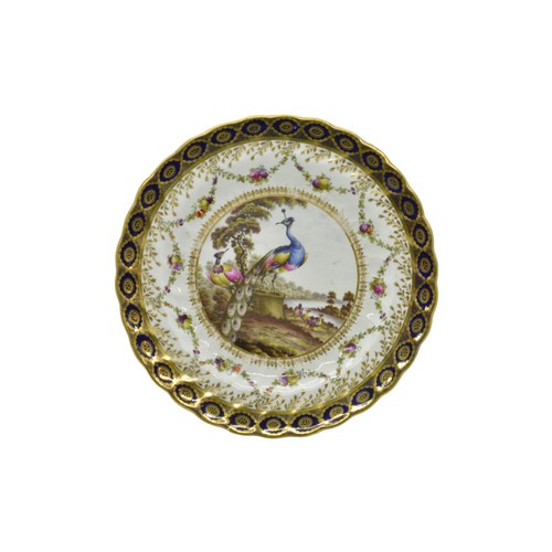 446 - A CHAMBERLAIN WORCESTER CABINET PLATEEarly 19th century painted with a peacock, a pair of Paris plat... 