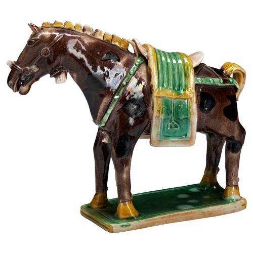 153 - A RARE SANCAI BISCUIT-GLAZED HORSE KANGXI PERIOD (1662-1722)素三彩馬  清 康熙 the biscuit figure of a spott... 