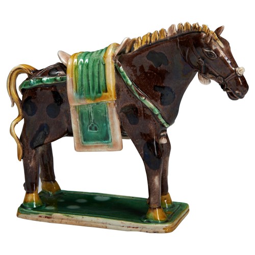 153 - A RARE SANCAI BISCUIT-GLAZED HORSE KANGXI PERIOD (1662-1722)素三彩馬  清 康熙 the biscuit figure of a spott... 