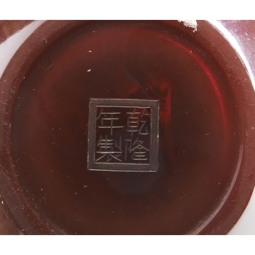 276 - A FINE TRANSLUCENT RUBY-RED GLASS BOTTLE VASEQIANLONG WHEEL CUT FOUR CHARACTER MARK AND OF THE PERIO... 