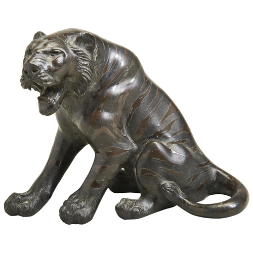 423 - A JAPANESE BRONZE OKIMONO OF A SEATED TIGER MEIJI PERIOD (1868-1912)naturalistically cast, underside... 