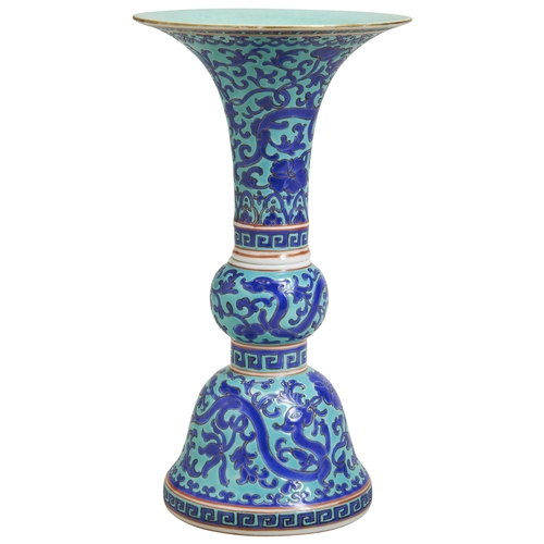 163 - A TURQUIOSE-GROUND BLUE-DECORATED VASELATE QING / REPUBLIC PERIODof trumpet-shape form, decorated wi... 