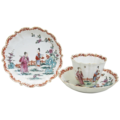 140 - A FAMILLE ROSE CUP AND TWO SAUCERSQING DYNASTY, 18TH CENTURY Depicting figures in a garden scene, de... 